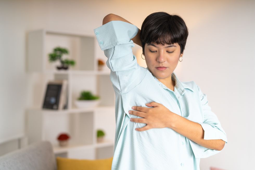 Woman checking breast cancer