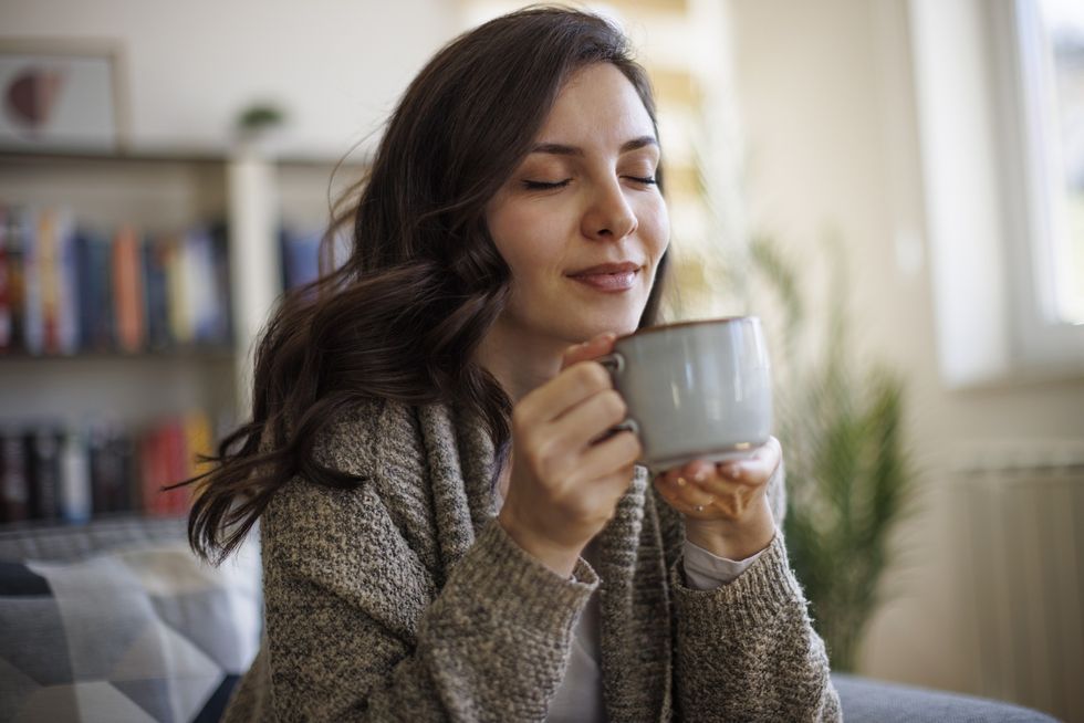 Woman drinking from a mug