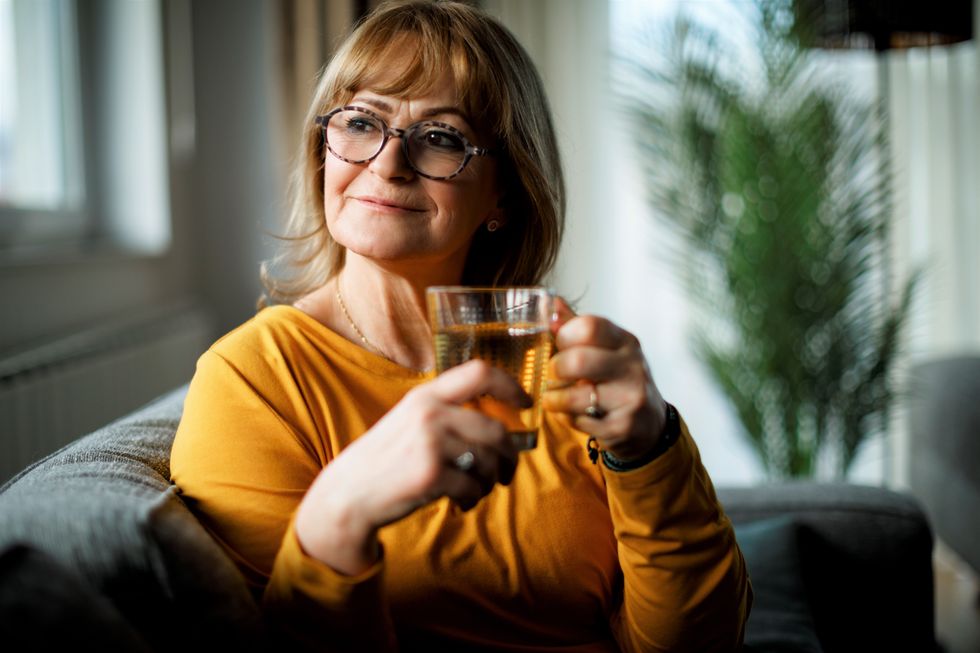 Woman drinking green tea