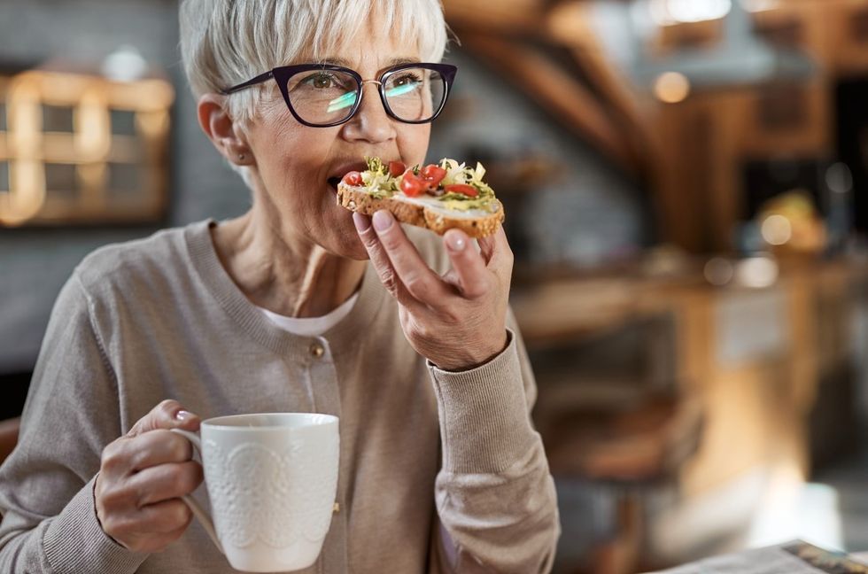 Woman eating drinking