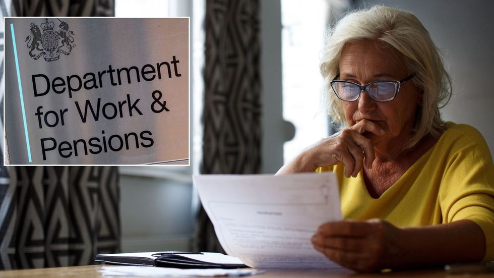 Woman looking at DWP letter