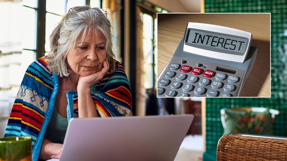 Woman looking at laptop