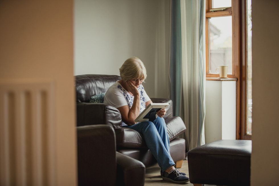 Woman looking at letter