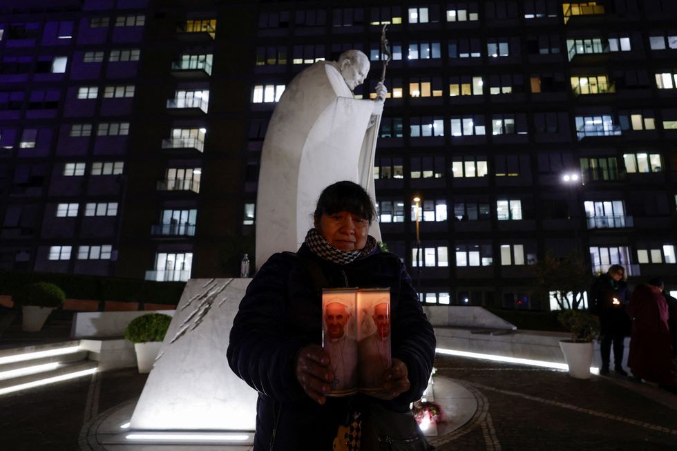 Woman praying for the pope