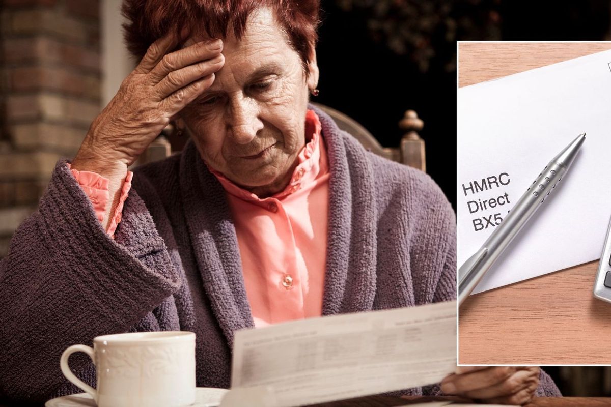 Woman reading letter and HMRC letter