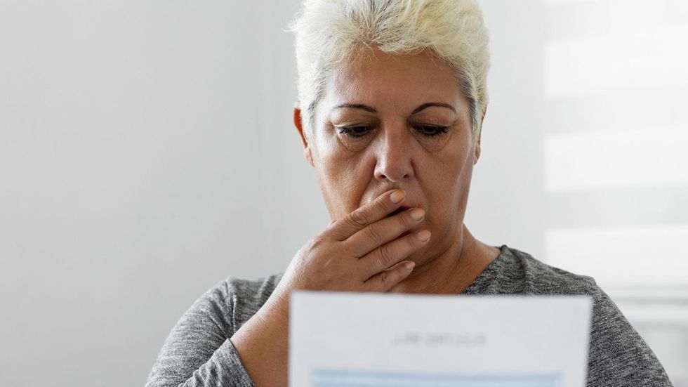 Woman shocked at letter