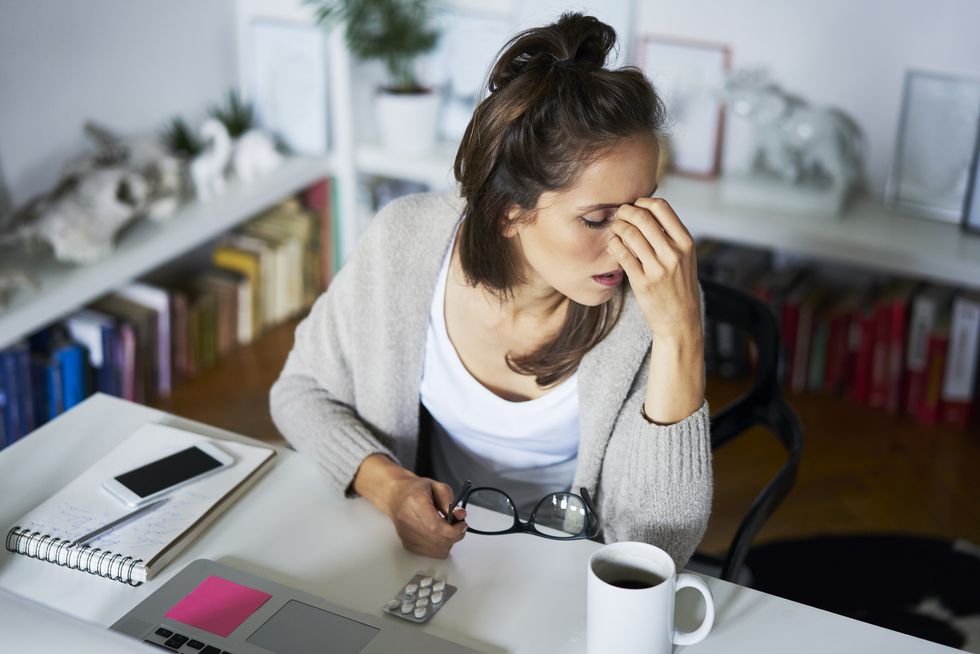 Woman working while unwell