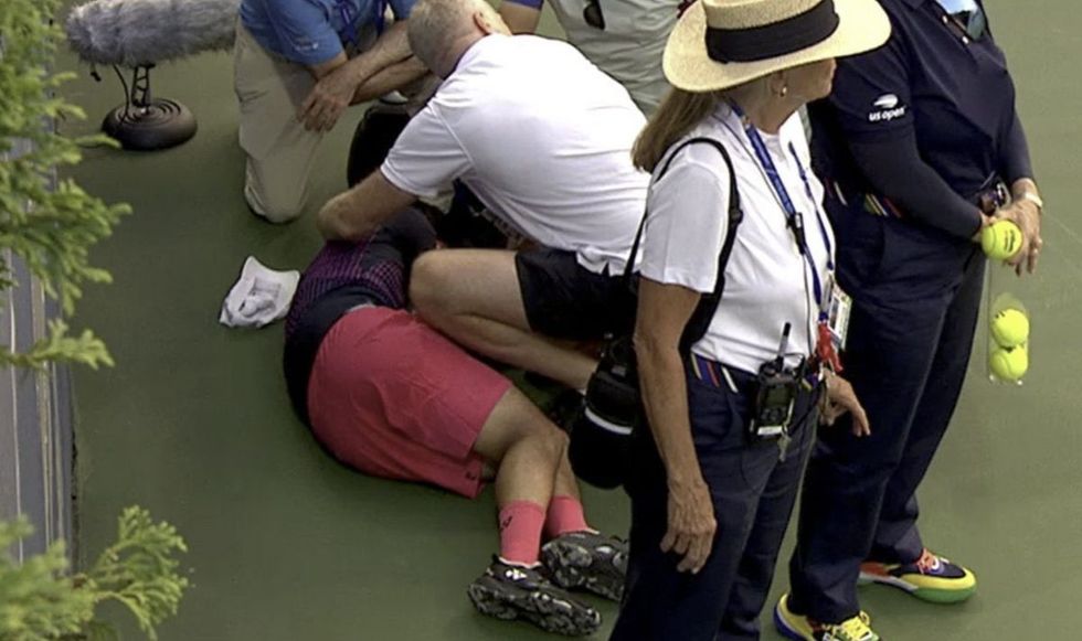 Yoshihito Nishioka was attended to by doctors